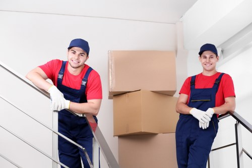 Moving crew preparing safely before lifting heavy items