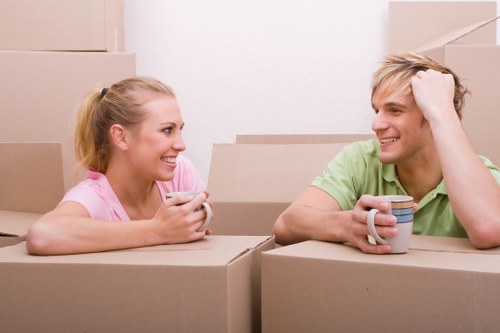 Packed boxes and furniture ready for loading into a removals van in Waterloo