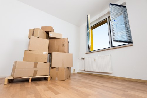 Business staff preparing desks and equipment for an office move in Waterloo