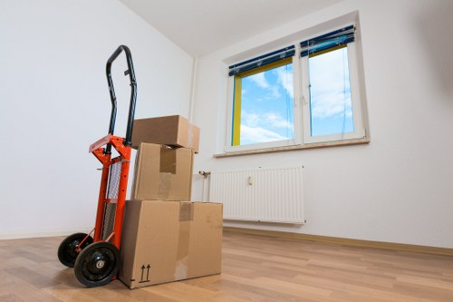 Packed office boxes and furniture ready for relocation in Waterloo
