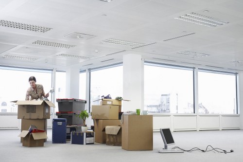 Packed boxes and furniture ready for transportation